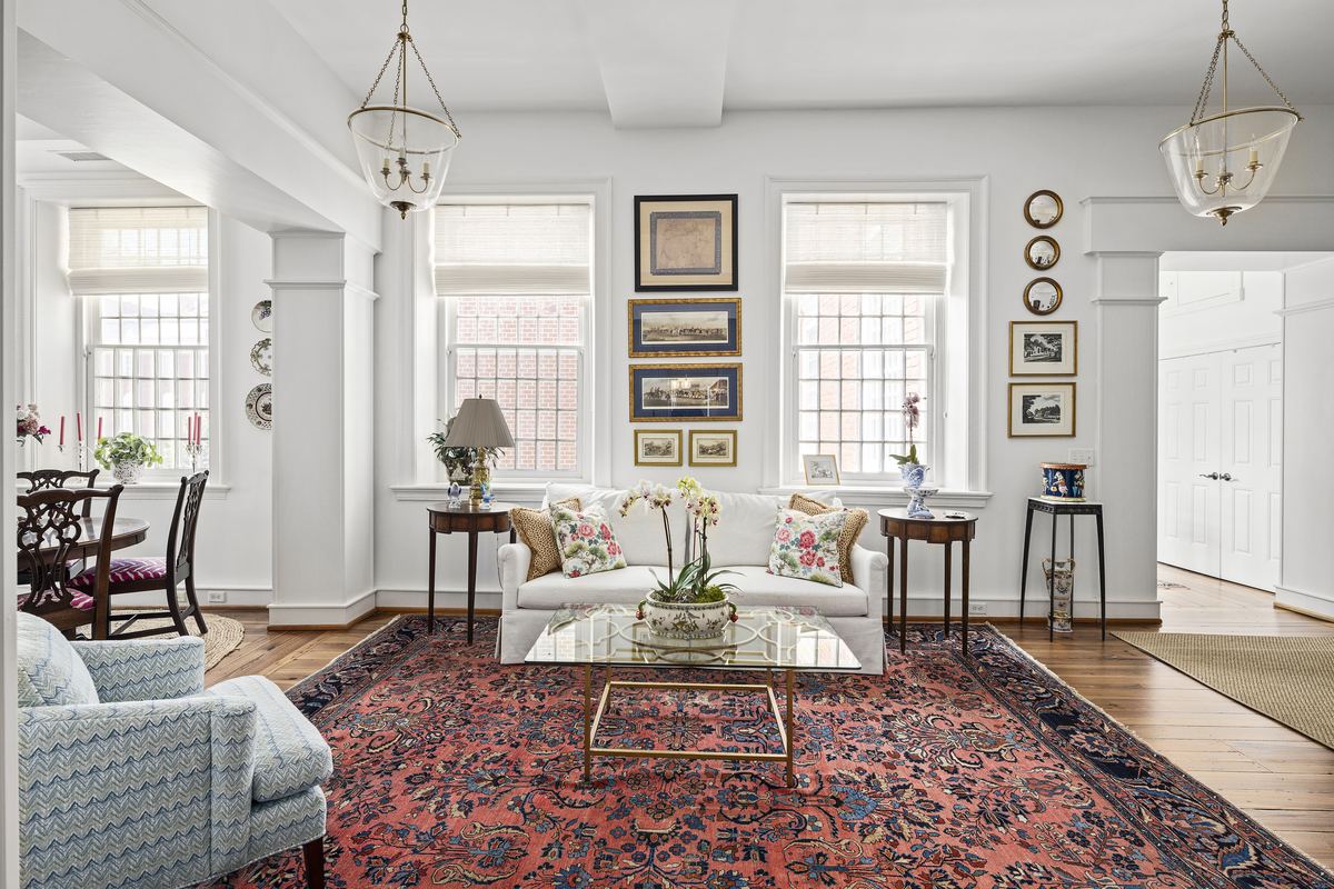 Living room with a gallery wall and tall windows, 100 Village Drive, Staunton